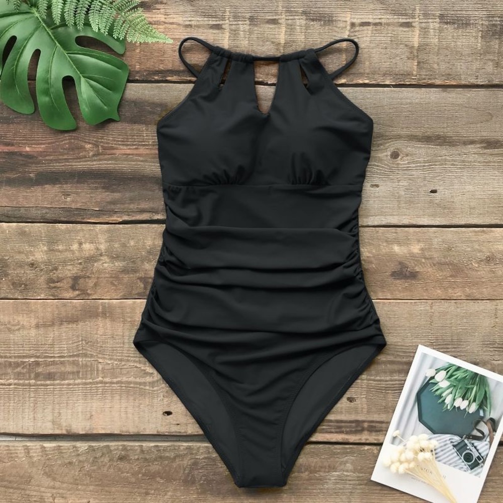 One piece swim suit.